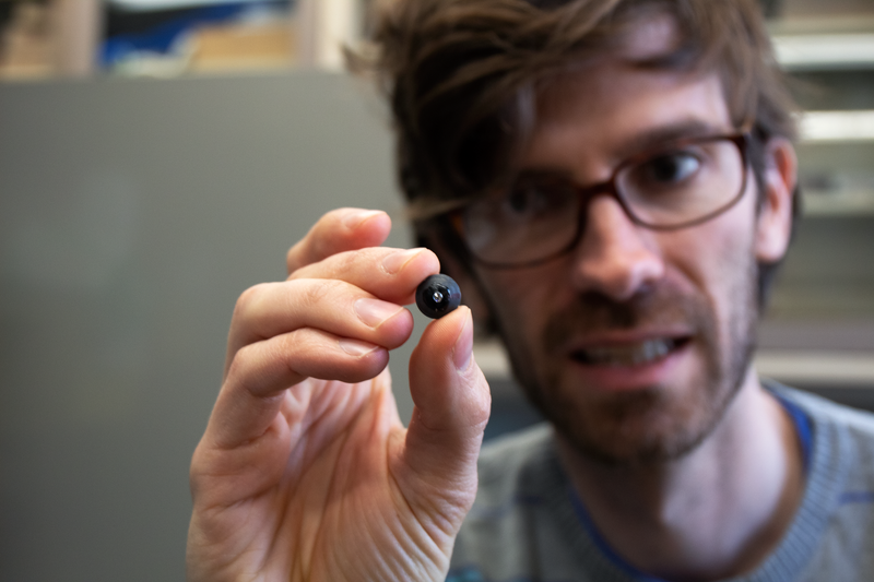 Geballe holding part of a diamond anvil cell.